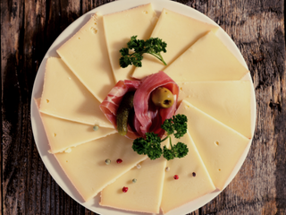 Raclettekäse Knoblauch in Scheiben 200 g